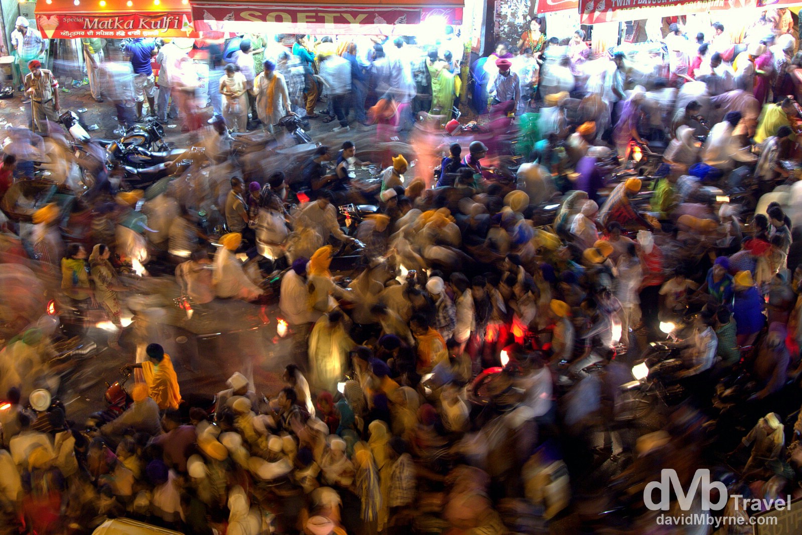 Crowds making their way to & from the Golden Temple along the crammed Old City streets of Amritsar, India. October 9th 2012.
