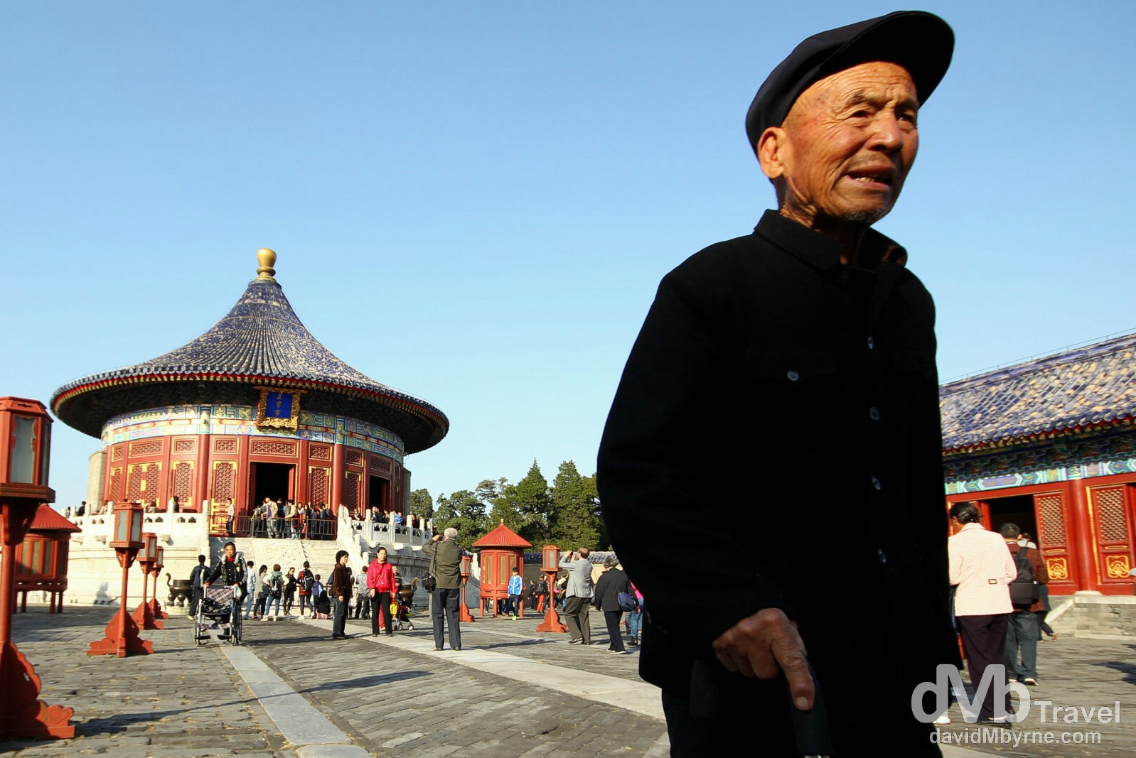 A man in the compound of the Imperial Vault of Heaven in the grounds of the Temple of Heaven complex, Beijing, China. October 27th 2012. 