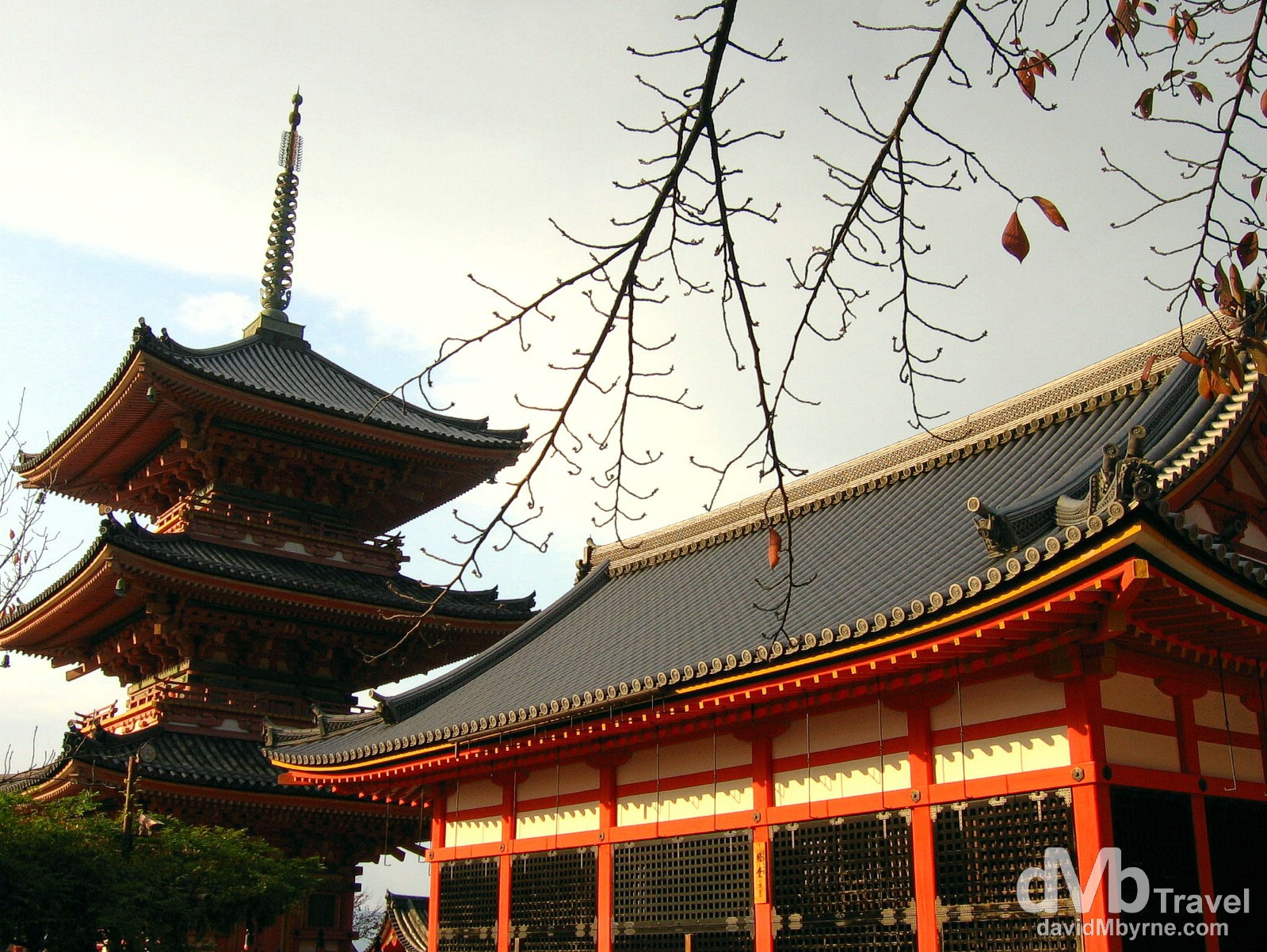 The three-storied pagoda (and another orange building) in the grounds of the Kiyomizu-dera temple. The temple originated in 778 and remains associated with the Hosso sect, one of the oldest sects within Japanese Buddhism. In 1994 the temple was added to the list of UNESCO world heritage sites, having being recognised as 'a place of exceptional and universal value; a cultural heritage site worthy of preservation for the benefit of all mankind'. Kiyomizu-dera Temple, Higashiyama-ku, Kyoto, Japan. November 20th 2007.