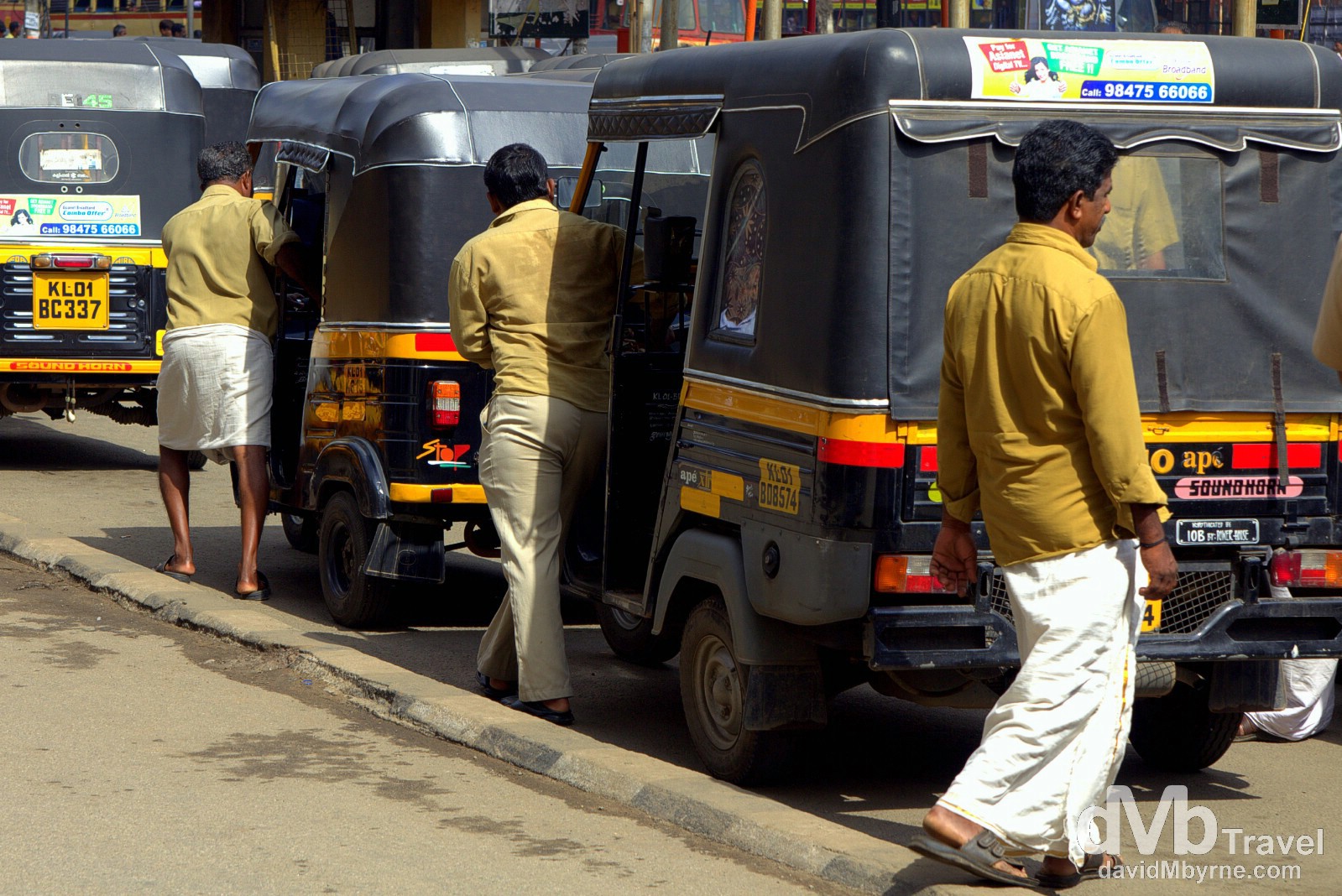 Tuk tuk drivers on the streets of Kollam, Kerala, India. September 16th 2012. 