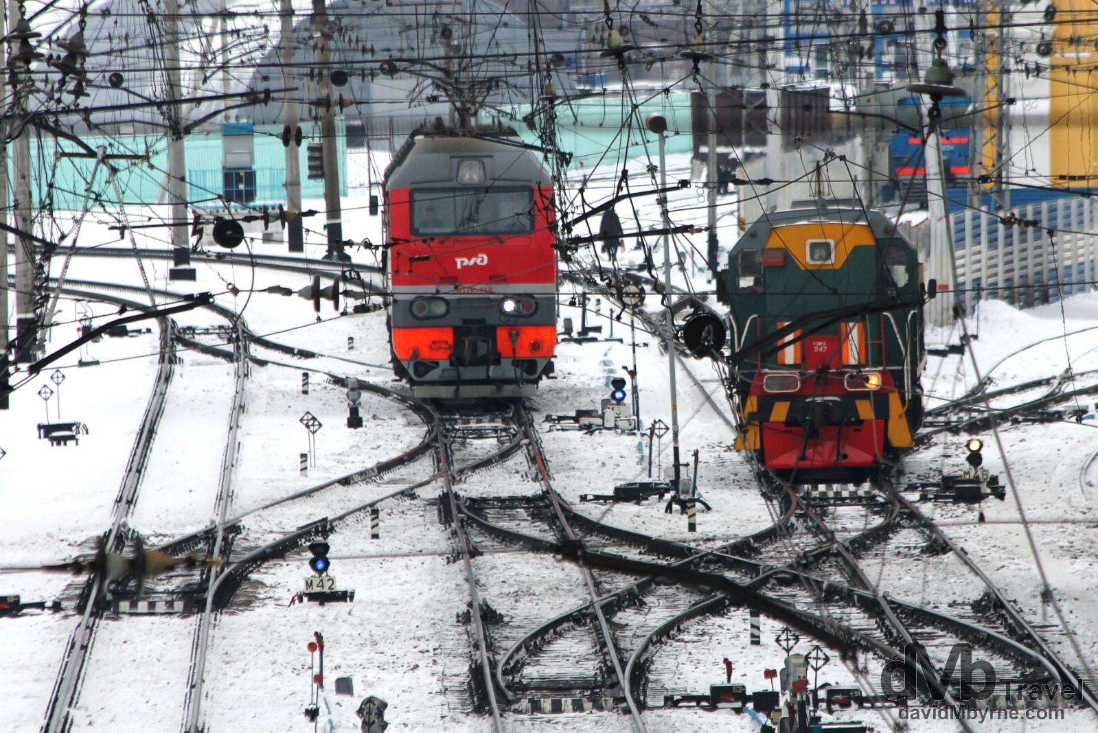 Locomotives sitting on the tracks in Tayga train station, Siberian Russia. November 12th 2012.