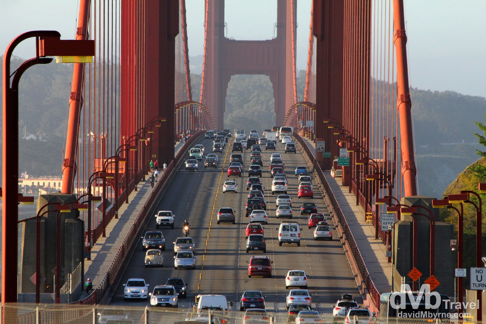 Early morning traffic traversing The Golden Gate Bridge as seen from Vista Point on the north-eastern side of the bridge. San Francisco, California, USA. April 9th 2013.