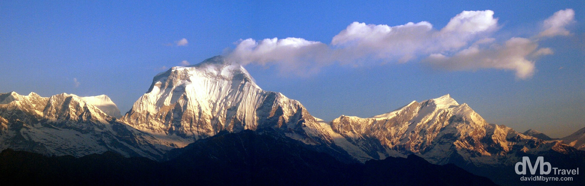 A panoramic picture of early sunrise on the face of Dhaulagiri (8,167 metres / 27,000 ft) as seen from Poon Hill, Annapurna Conservation Area, western Nepal. March 12th, 2008.