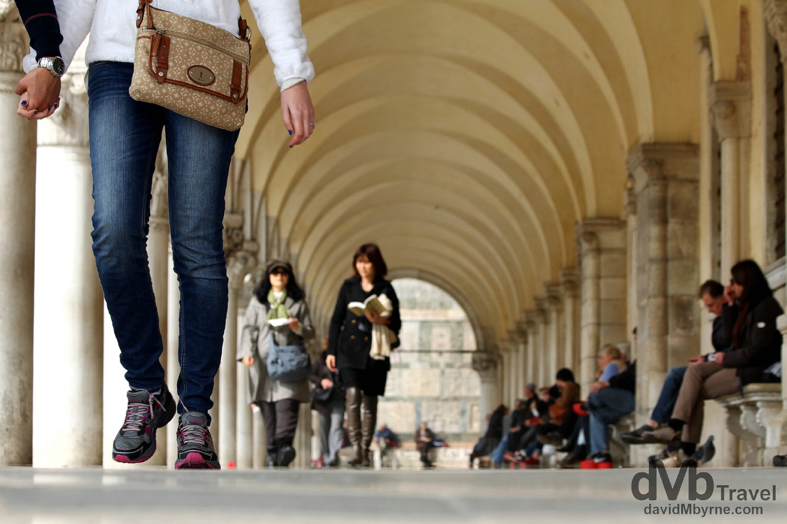 Walking under the arches of Palazzo Ducale, Venice, Italy. March 19th, 2014.
