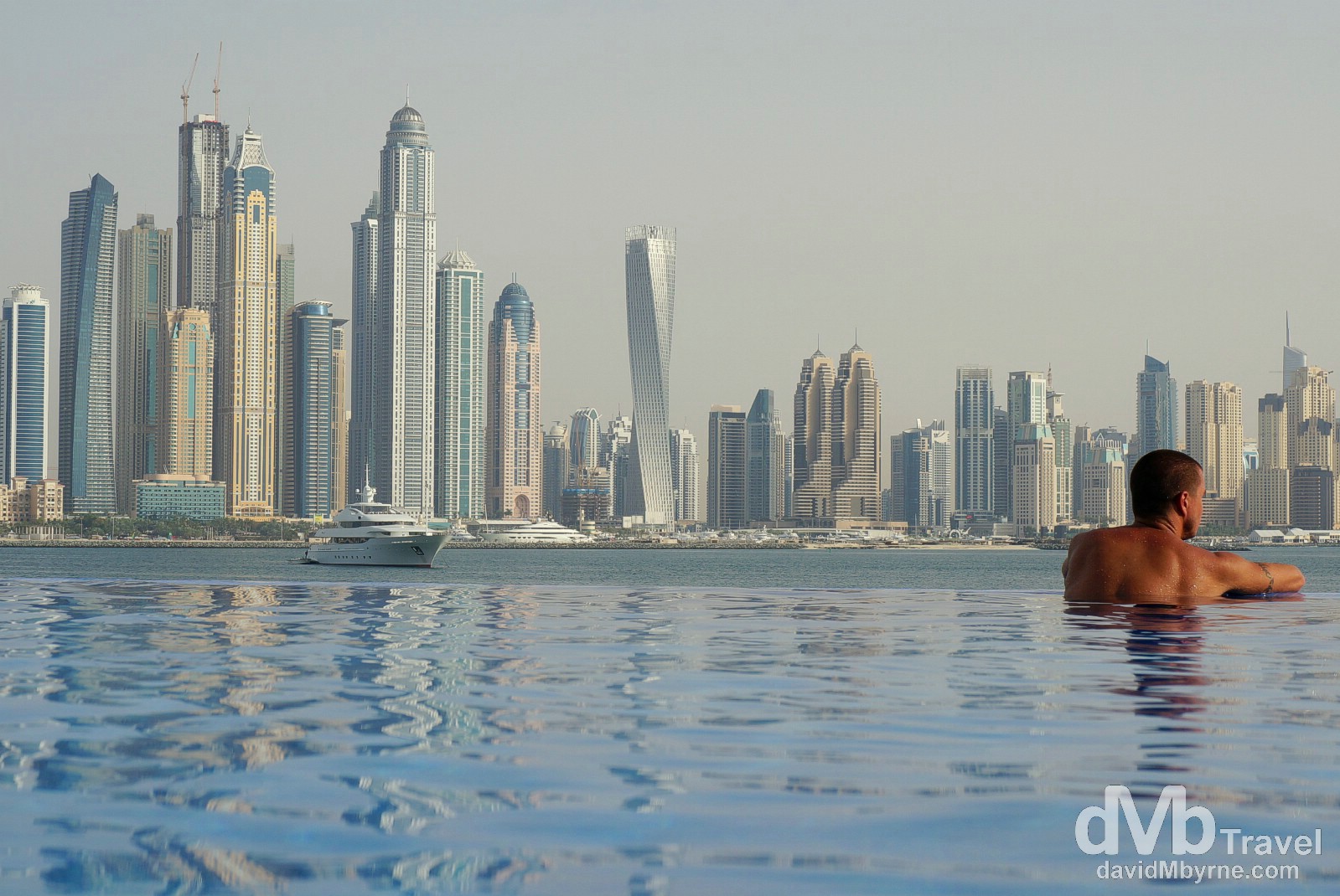 The towers of Dubai Marina as seen from the infinity pool of the Oceania Beach Club, Palm Jumeirah, Dubai, UAE. April 19th, 2014.