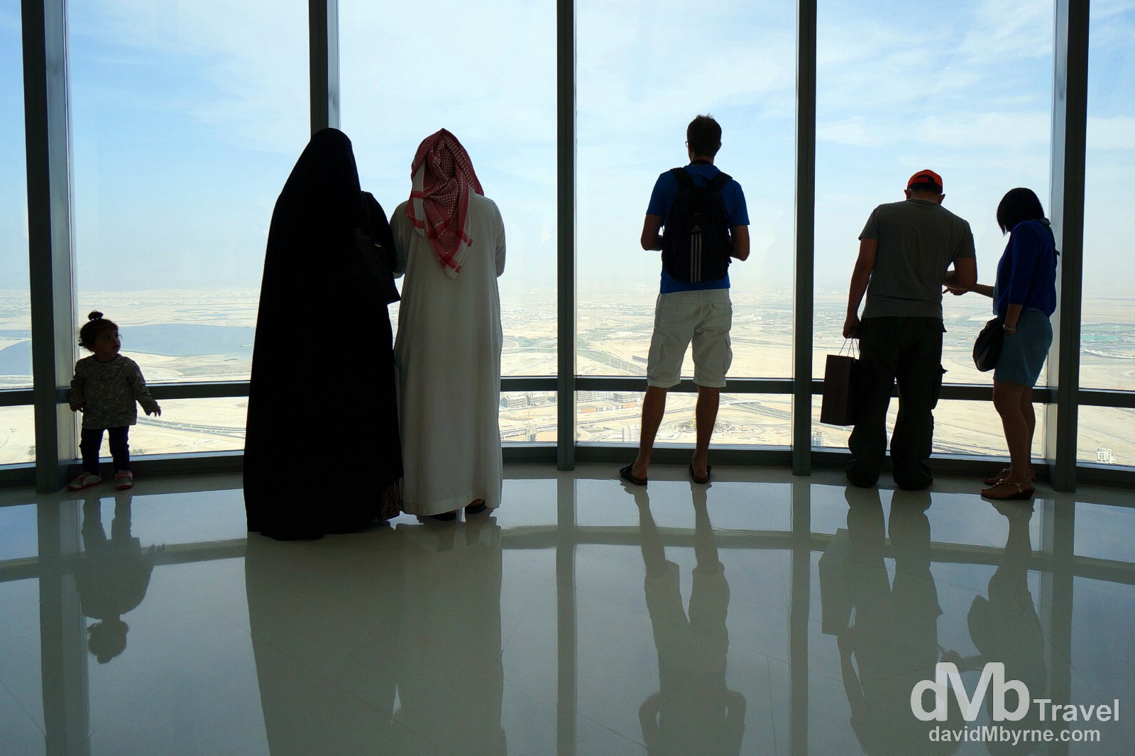 Viewing Dubai from At The Top, the 124th floor viewing deck of the 829.8 metre Burj Khalifa, the world's tallest building. Dubai, UAE. April 18th, 2014. 