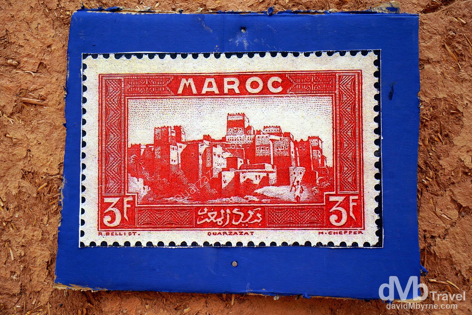 A reproduction of an old Maroc (Morocco) stamp on the walls of the Kasbah Taourirt in Ouarzazate, Morocco. May 13th, 2014.