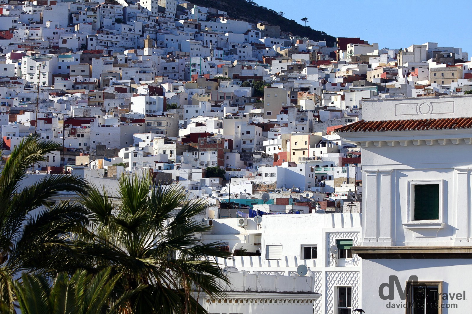 The whitewashed buildings of northern Teotuan at the foot of the northern Rif mountains as seen from Ville Nouvelle. Tetouan, Morocco. June 2nd, 2014.