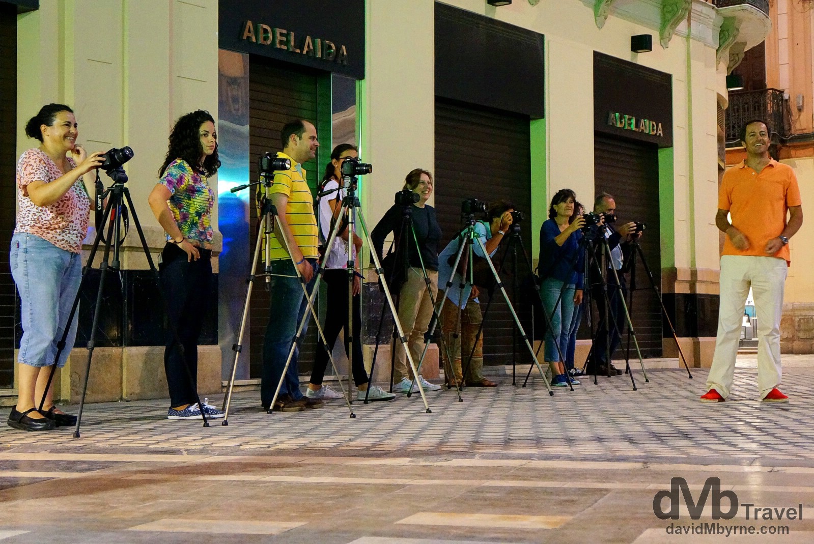 A photo workshop doing their thing on the streets of Malaga, Andalusia, Spain. June 9th, 2014.
