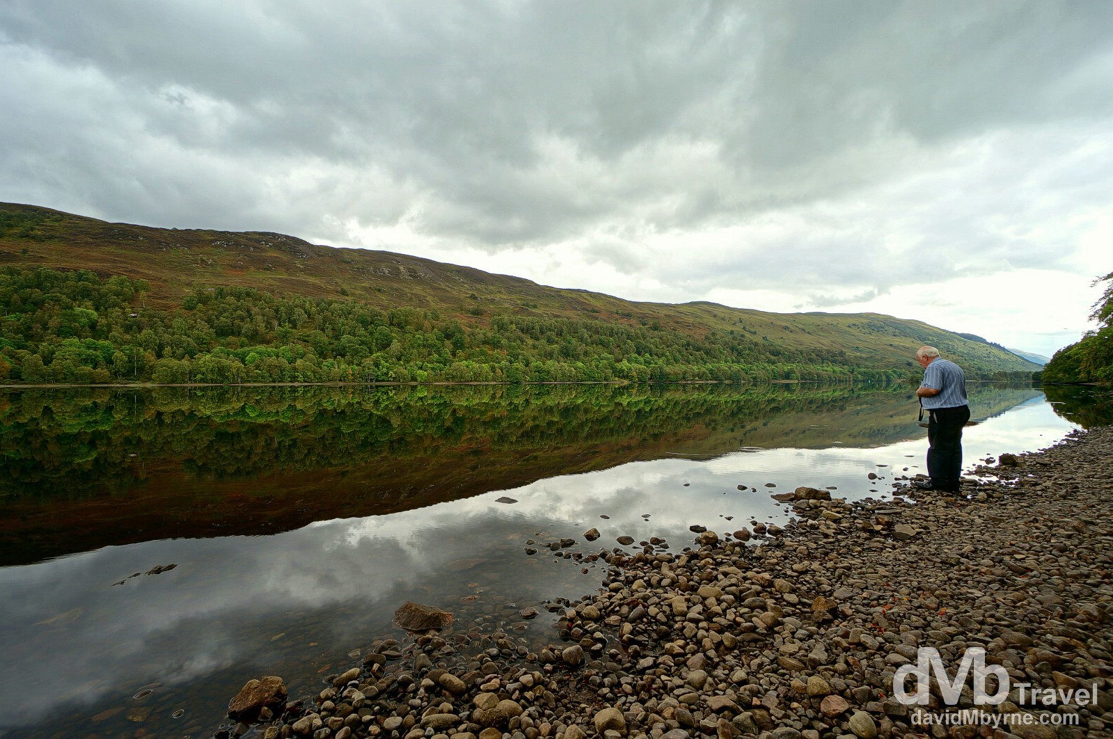 Admiring the reflections of Loch Oich in Highland, Scotland. September 16, 2014.