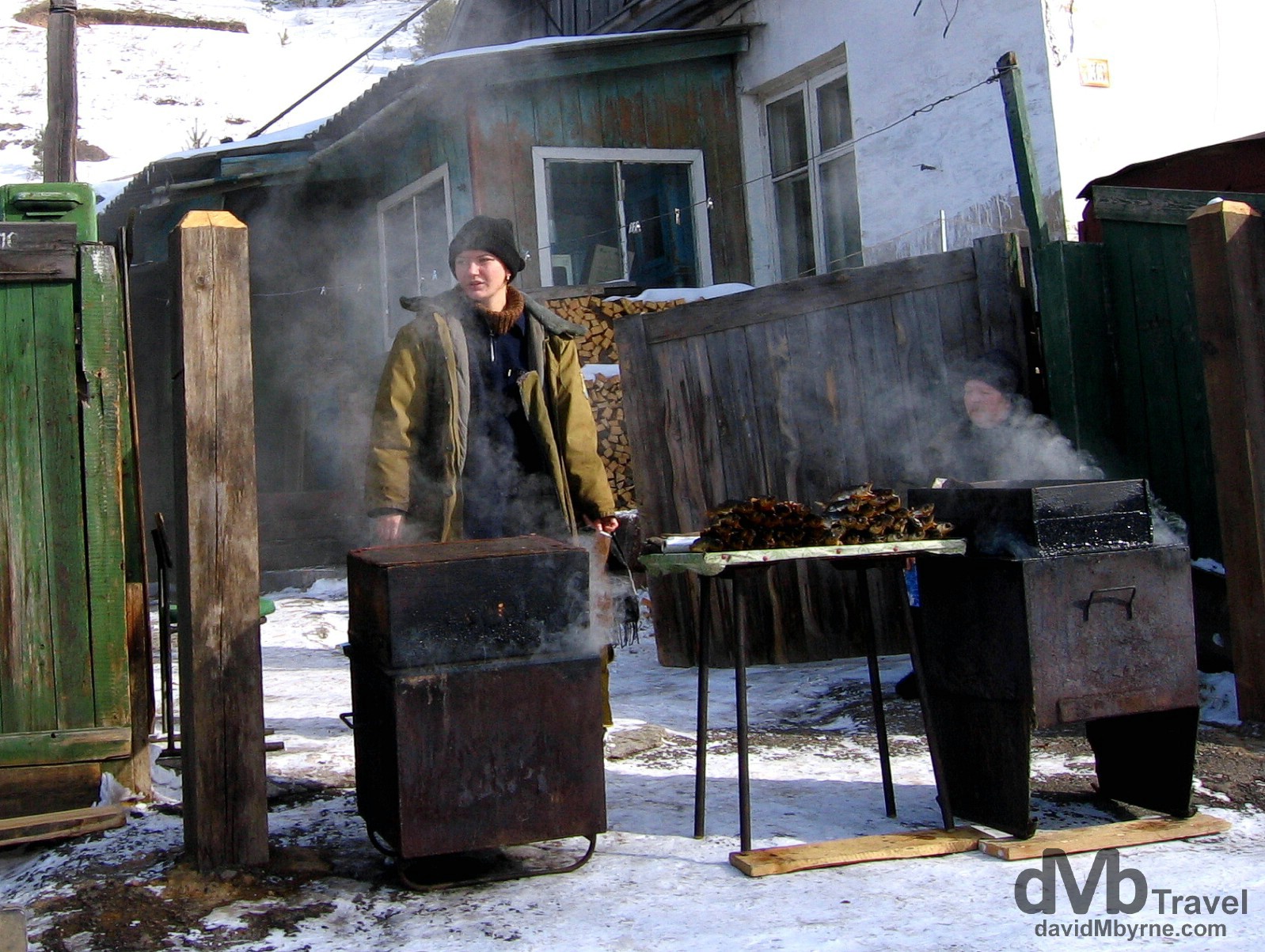 Omul sellers in the village of Listvyanka on the shores of Lake Baikal in Siberian Russia. February 18, 2006. 