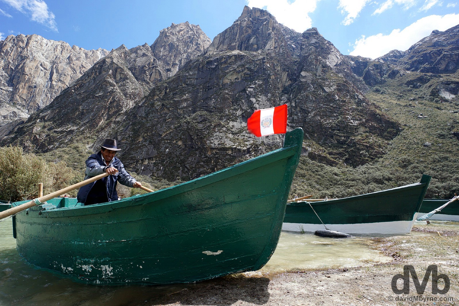 A boatman on Lago (Lake) Chinan Cocha in Parque Nacional Huascaran, Ancash, Peru. August 5, 2015. 