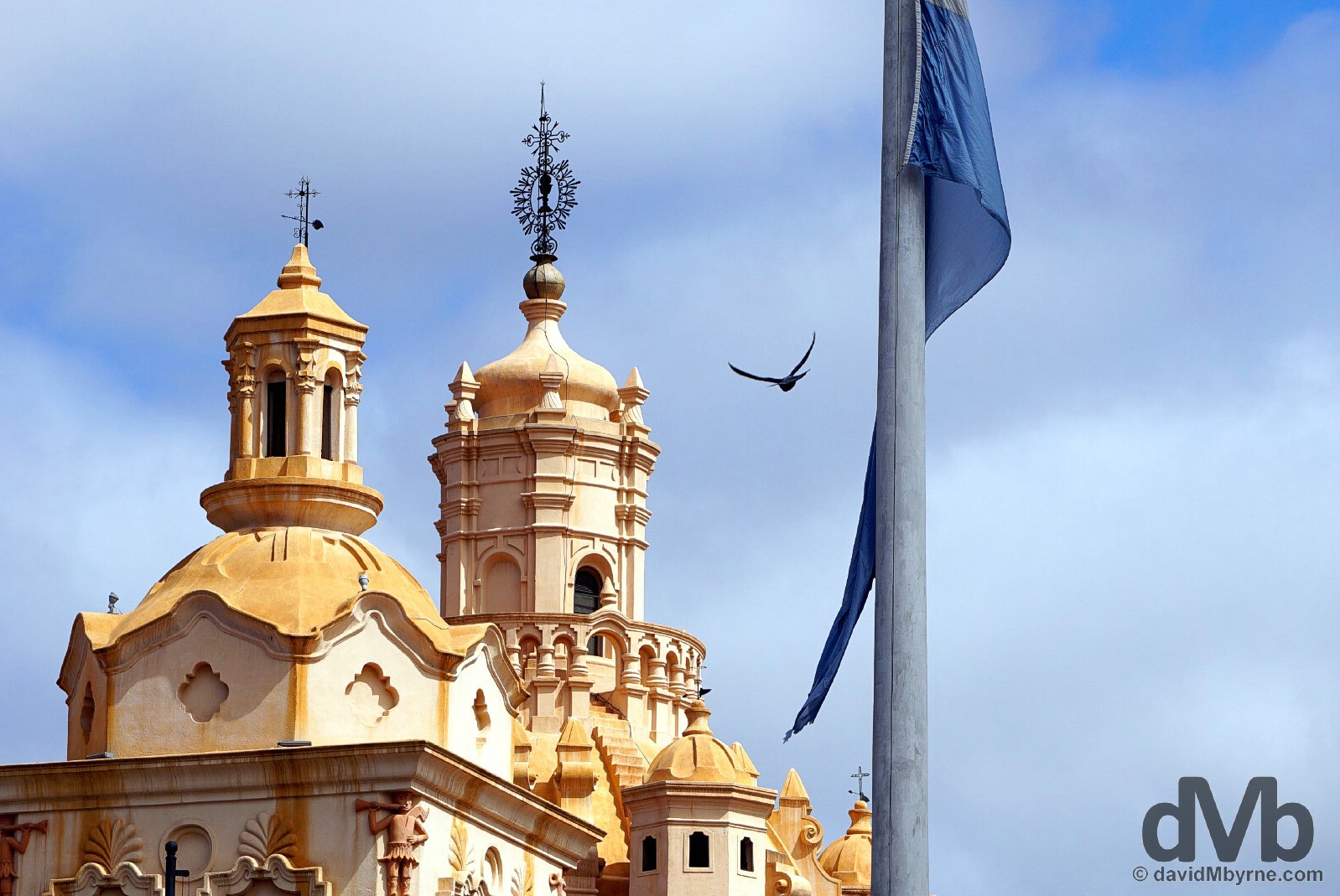 The cathedral & a flag pole as seen from Plaza San Martin in Cordoba, Argentina. September 24, 2015. 