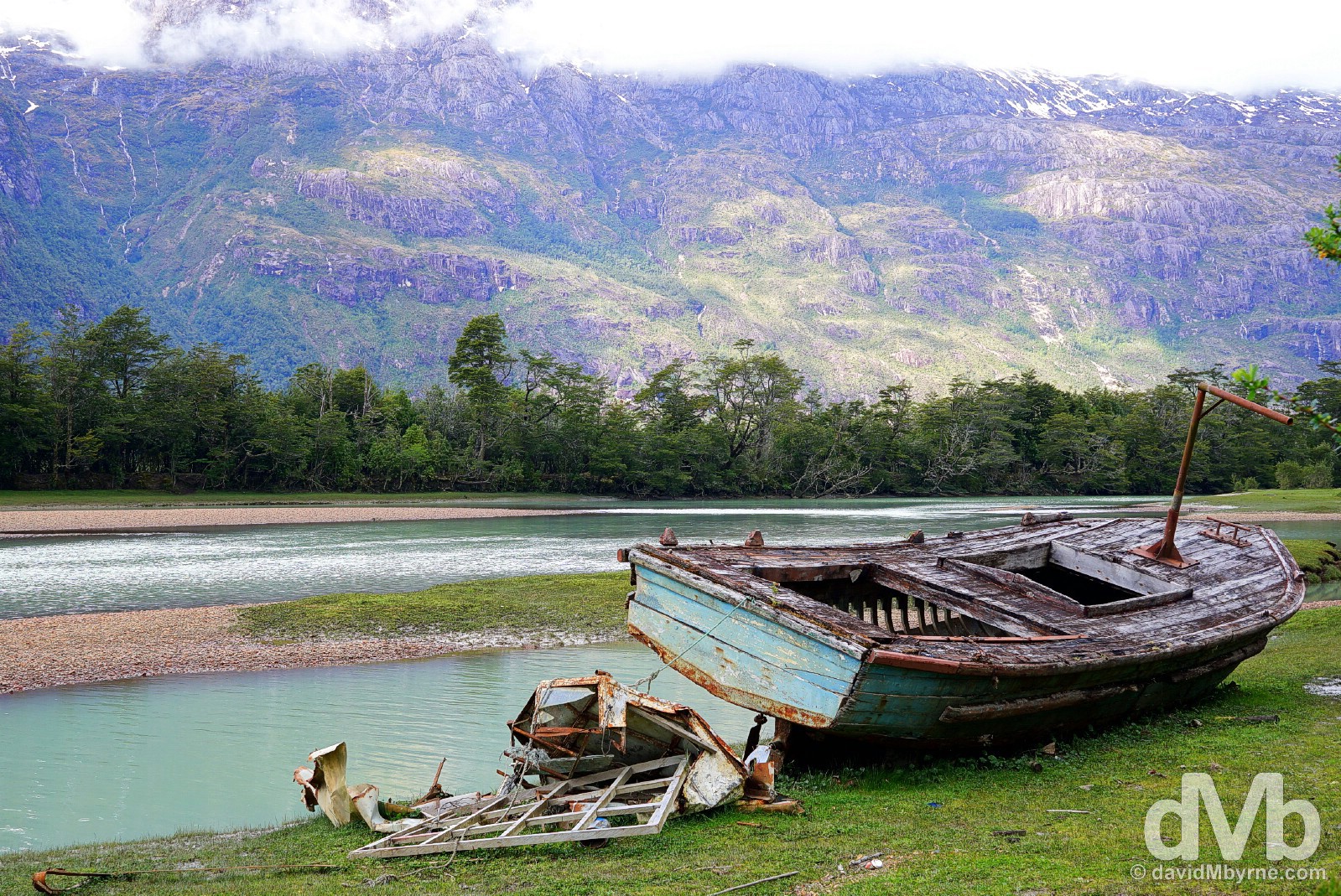 A disused boat laying by the Baker River outside Caleta Tortel in Aysen, Chile. October 28, 2015.