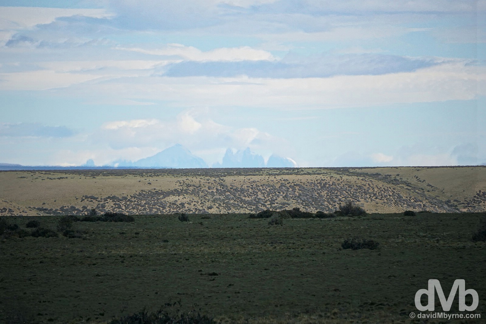 The distant peaks of Torres del Paine in Chile as seen from Ruta 5 in southern Patagonia, Argentina. November 1, 2015.
