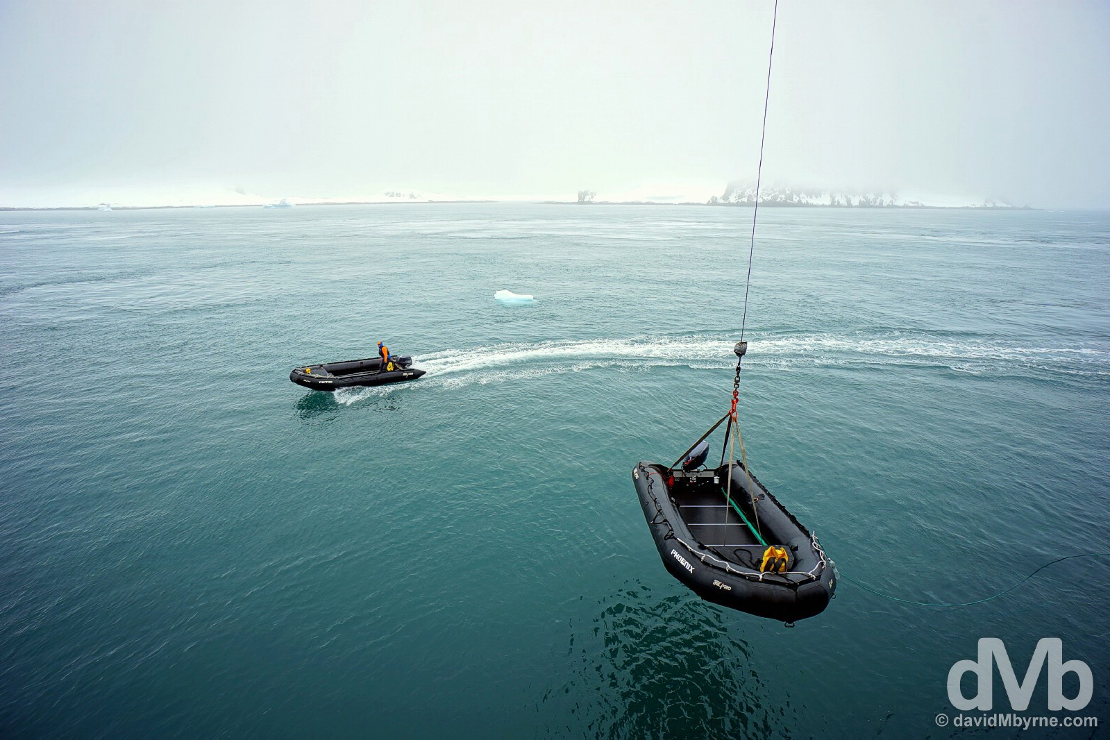 Zodiacs being lowered from the M/V Ocean Endeavour into the water after arrival at the sub-Antarctic Aticho Island group of the South Shetland Islands. November 28, 2015.
