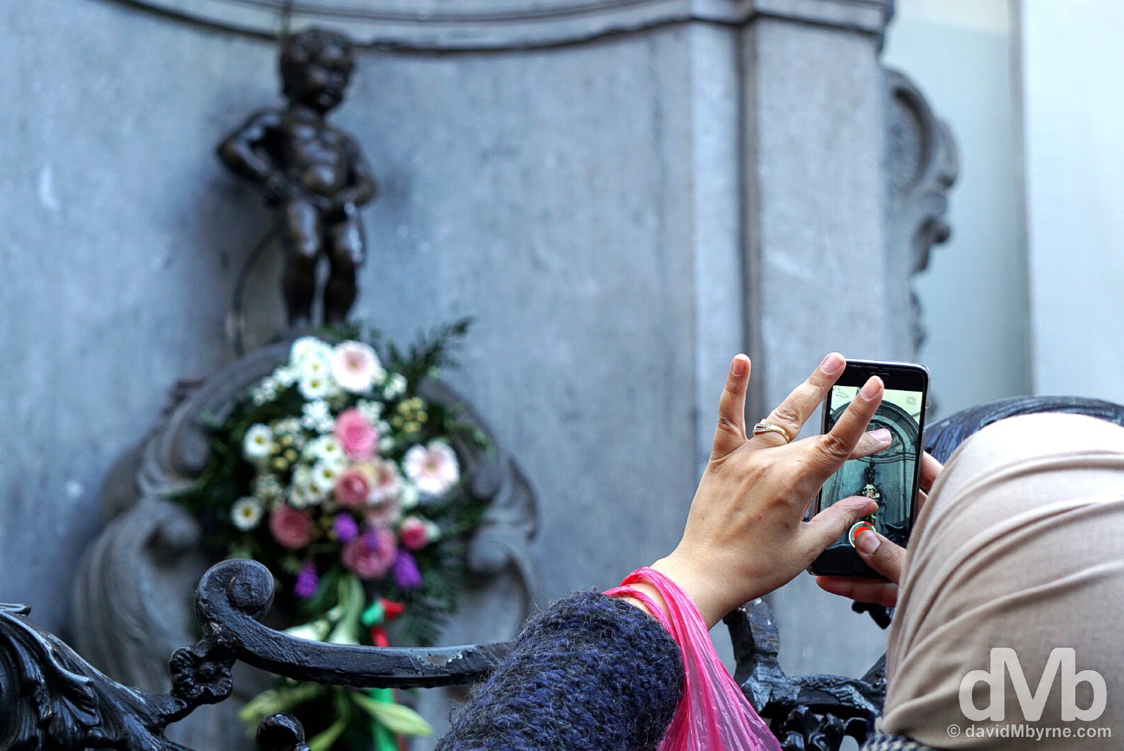 Capturing the tiny Manneken Pis statue, a national symbol of Belgium. Brussels, Belgium. January 14, 2016
