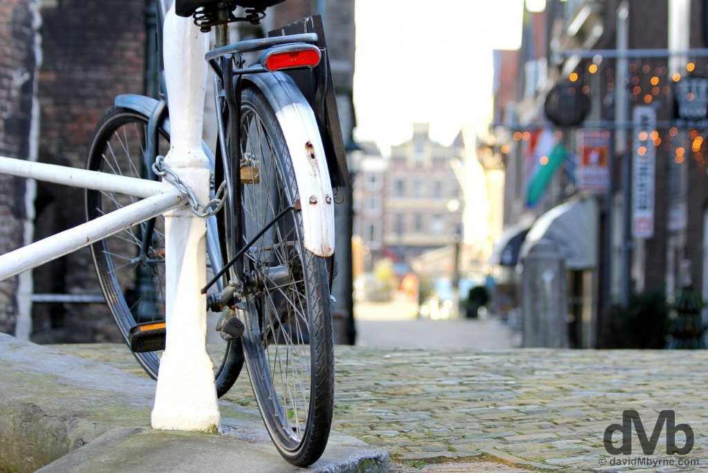 A bicycle by the canal in Delft, Netherlands. January 18, 2016.