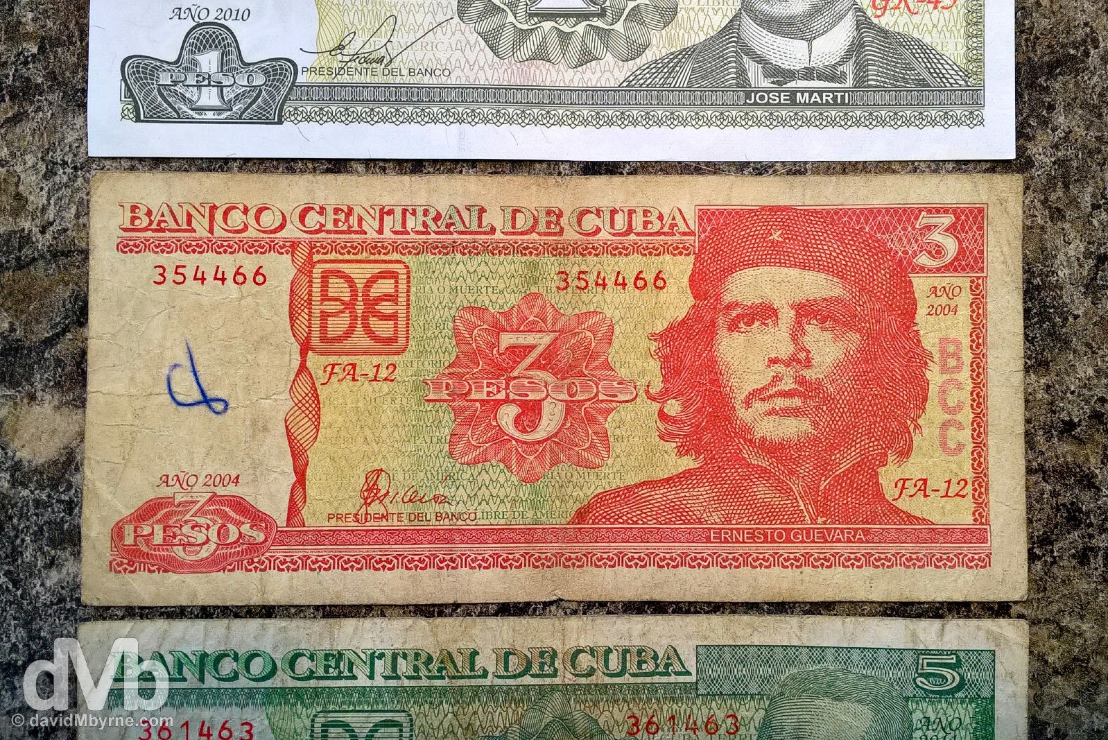 Cuban pesos, MN, moneda nacional. Barely worth the paper it's printed on.  