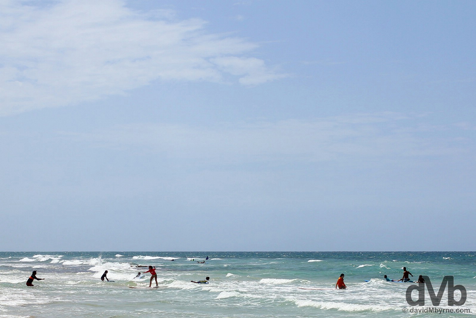 Surfing lessons on Playa Ocean Park in San Juan, Puerto Rico, Greater Antilles. June 1, 2015.