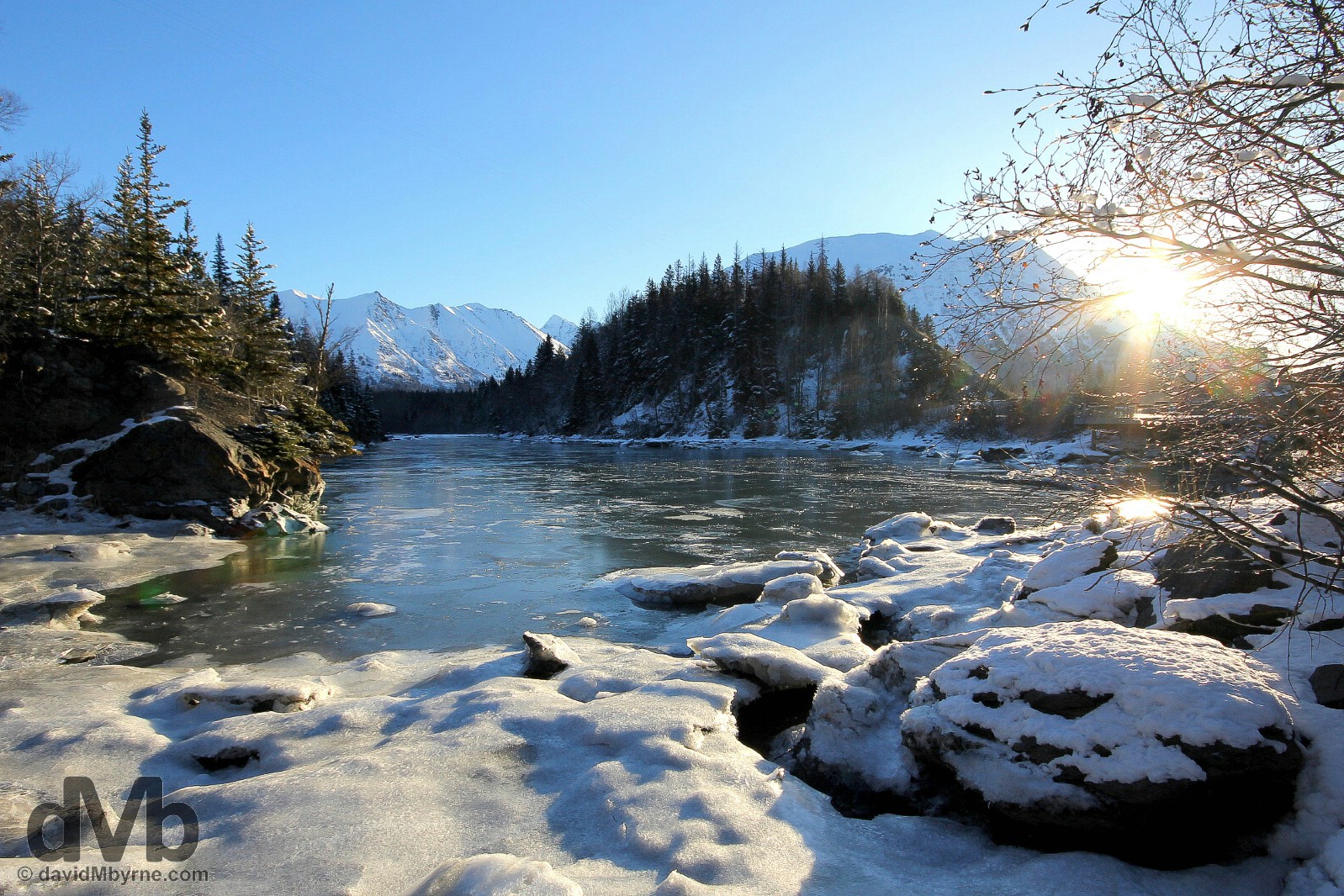 The first rays of the day in Bird Creek off the Seward Highway, Alaska, USA. March 12, 2013.