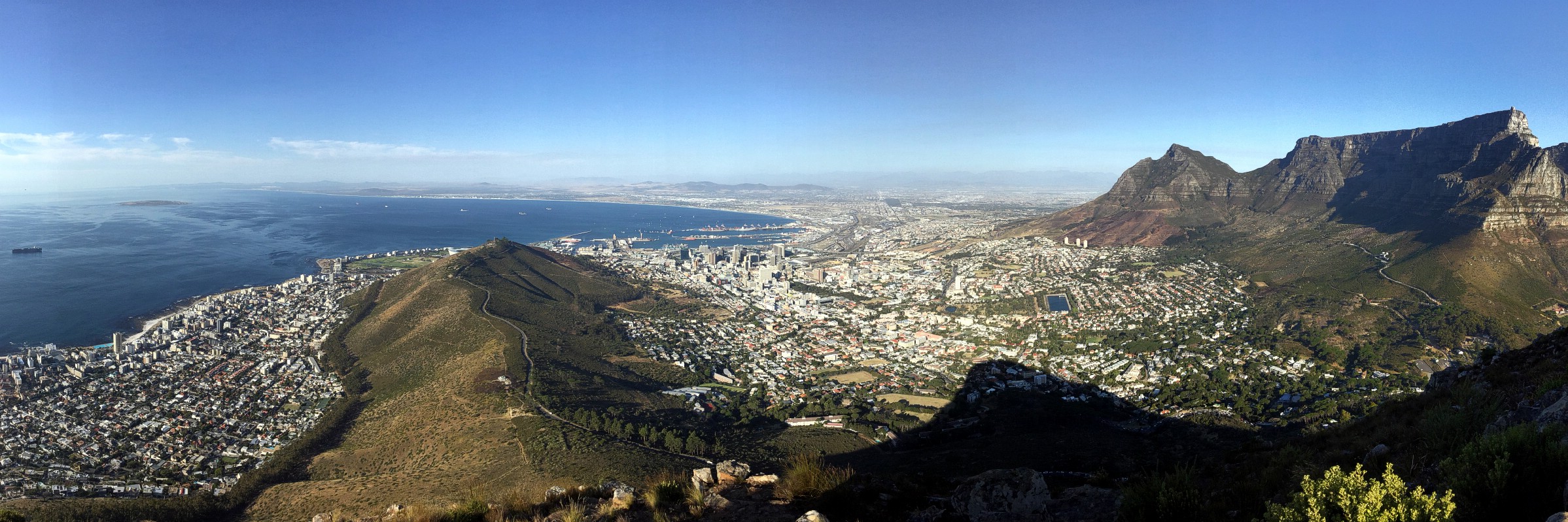 A panorama of (L-R) Table Bay, Signal Hill, Cape Town & Table Mountain as seen from the top of Lion's Head, Western Cape, South Africa. February 22, 2017.