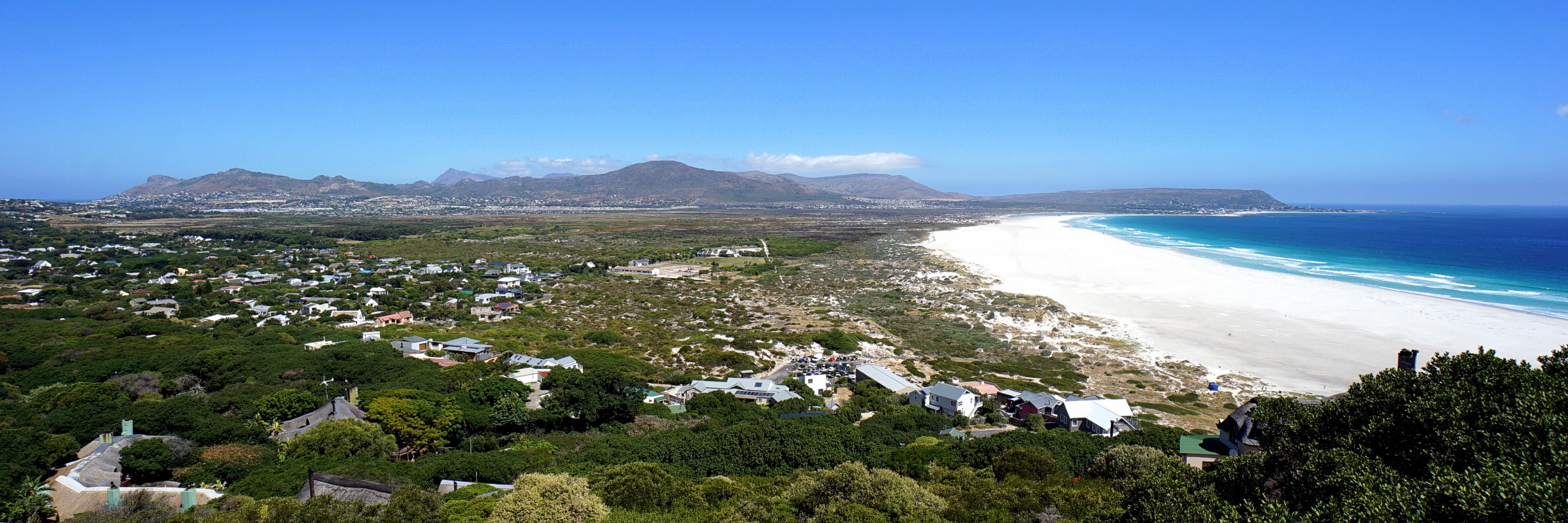 A panorama over Noordhoek Beach & Chapman's Peak as seen from the end of Chapman's Peak Drive, Cape Peninsula, Western Cape, South Africa. February 17, 2017.